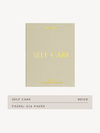 Beige book titled 'Self-Care' with yellow text on a white background