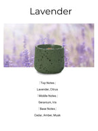 Green candle in a terracotta pot with lavender background and fragrance notes text.