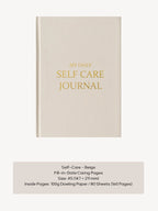 Beige self-care journal with gold text on a white background