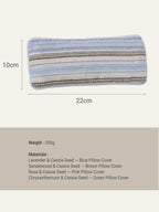 Striped pillow cover with dimensions and material information on a beige background