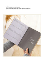Gray journal with self-dating inserts held by a person, with text about the product on a light background.