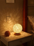 Decorative lamp on a nightstand with warm lighting