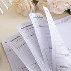 Meditation journals with a bouquet of white roses on a light surface