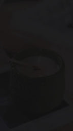 11-second video of green textured concrete jar soy wax candle – lighting with a match, warm flame glow, and close-up of rustic texture, paired with soft English background music (cozy relaxation ambiance)