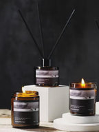 18-second video of amber glass jar aromatherapy soy wax candle – multi-angle shots (display with diffuser, close-up label, wicker tray placement, lighting with match) showcase warm glow & 200g size, paired with calming background music (cozy home ambiance)